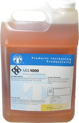 Master Fluid Solutions - Trim MQL 1000, 1 Gal Bottle Cutting Fluid - Straight Oil, For Drilling, Milling, Reaming, Sawing, Tapping - Exact Tool & Supply