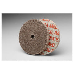 Scotch-Brite EXL Unitized Wheel XL-UW 8A Medium 4″ × 1/4″ × 1/4″ - Exact Tool & Supply