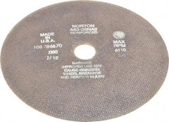 Norton - 10" 60 Grit Aluminum Oxide Cutoff Wheel - 0.06" Thick, 1-1/4" Arbor, 6,110 Max RPM, Use with Stationary Grinders - Exact Tool & Supply