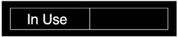 NMC - In Use/Vacant, 10" Wide x 2" High, Plastic Sign - English, White on Black, Wall Mount - Exact Tool & Supply