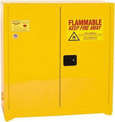 Eagle - 2 Door, 3 Shelf, Yellow Steel Standard Safety Cabinet for Flammable and Combustible Liquids - 44" High x 43" Wide x 18" Deep, Manual Closing Door, 3 Point Key Lock, 40 Gal Capacity - Exact Tool & Supply