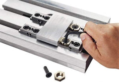 Kurt - 11/16" Aluminum Bronze Hex, 1/4-20 Stud Thread, Symmetrical Hex Clamp - 3/16" Hex Height, 987 Lb Holding Force, Alloy Steel Stud, 0.625" Long Thread, 11 Ft/Lb Torque, 6 Clamps - Exact Tool & Supply