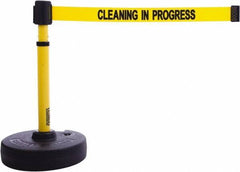 Banner Stakes - 22 to 42" High, 2-3/8" Pole Diam, Barrier Post Base & Stanchion - 9" Base Diam, Round Nylon Base, Yellow Plastic Post, 15' x 2-1/2" Tape, For Outdoor Use - Exact Tool & Supply
