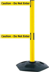 Tensator - 38" High, 2-1/2" Pole Diam, 4 Way Stanchion - 19" Base Diam, Octagon Recycled Rubber Base, Yellow Plastic Post, 13' x 2" Tape, Dual Line Tape, For Outdoor Use - Exact Tool & Supply