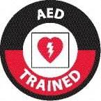 NMC - AED Trained, Hard Hat Label - Round, White & Red on Black, 0.004" Thick, Indoor or Outdoor, Adhesive Backed, For Accident Prevention - Exact Tool & Supply