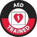NMC - AED Trained, Hard Hat Label - Round, White & Red on Black, 0.004" Thick, Indoor or Outdoor, Adhesive Backed, For Accident Prevention - Exact Tool & Supply