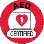 NMC - AED Certified, Hard Hat Label - Round, Black & Red on White, 0.004" Thick, Indoor or Outdoor, Adhesive Backed, For Certified Operator - Exact Tool & Supply