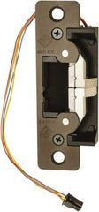 Adams Rite - 4.88" Long x 1-1/4" Wide, Dark Bronze Anodized Aluminum Finish, Electric Door Strike - Field Selectable 12 or 24 VDC & 12-24 VAC, VAC/VDC Power, Zinc Alloy - Exact Tool & Supply
