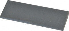 Norton - 4-1/2" Long x 1-3/4" Diam x 1/2" Thick, Silicon Carbide Sharpening Stone - Round, Fine Grade - Exact Tool & Supply