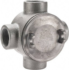 Thomas & Betts - (4) 1-1/4" Knockouts, Iron Round GUAX - 4.38" Overall Width x 2.69" Overall Depth - Exact Tool & Supply