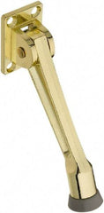 National Mfg. - 5" Projection Kickdown Door Stop - Screw Mount, Brass Finish - Exact Tool & Supply