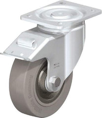 Blickle - 6-1/2" Diam x 1-31/32" Wide x 7-61/64" OAH Top Plate Mount Swivel Caster with Brake - Solid Rubber, 990 Lb Capacity, Ball Bearing, 5-1/2 x 4-3/8" Plate - Exact Tool & Supply