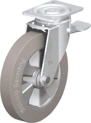 Blickle - 10" Diam x 2" Wide x 11-39/64" OAH Top Plate Mount Swivel Caster with Brake - Solid Rubber, 1,430 Lb Capacity, Ball Bearing, 5-1/2 x 4-3/8" Plate - Exact Tool & Supply