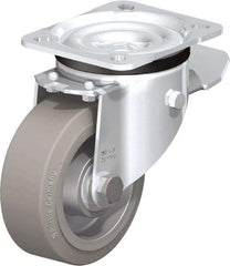 Blickle - 4" Diam x 1-37/64" Wide x 5-7/64" OAH Top Plate Mount Swivel Caster with Brake - Solid Rubber, 440 Lb Capacity, Ball Bearing, 3-15/16 x 3-3/8" Plate - Exact Tool & Supply