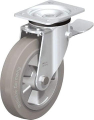 Blickle - 8" Diam x 1-31/32" Wide x 9-41/64" OAH Top Plate Mount Swivel Caster with Brake - Solid Rubber, 1,100 Lb Capacity, Ball Bearing, 5-1/2 x 4-3/8" Plate - Exact Tool & Supply