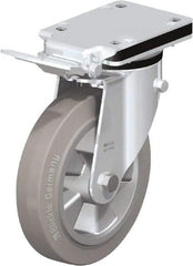 Blickle - 8" Diam x 1-31/32" Wide x 10-5/16" OAH Top Plate Mount Swivel Caster with Brake - Solid Rubber, 1,100 Lb Capacity, Ball Bearing, 5-1/2 x 4-3/8" Plate - Exact Tool & Supply