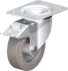 Blickle - 5" Diam x 1-37/64" Wide x 6-7/64" OAH Top Plate Mount Swivel Caster with Brake - Solid Rubber, 550 Lb Capacity, Ball Bearing, 5-1/2 x 4-3/8" Plate - Exact Tool & Supply