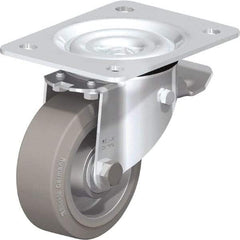 Blickle - 4" Diam x 1-37/64" Wide x 5-7/64" OAH Top Plate Mount Swivel Caster with Brake - Solid Rubber, 440 Lb Capacity, Ball Bearing, 5-1/2 x 4-3/8" Plate - Exact Tool & Supply