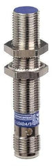 Telemecanique Sensors - NPN, 4mm Detection, Cylinder Shielded, Inductive Proximity Sensor - 3 Wires, IP67, IP69K, 12 to 48 VDC, M12x1 Thread, 2.44 Inch Long - Exact Tool & Supply