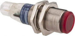 Telemecanique Sensors - 4 Pin M12 Connector, 2m Nominal Distance, Shock and Vibration Resistant, Polarized Retroreflective Photoelectric Sensor - 12 to 24 VDC, 500 Hz, Nickel Plated Brass, 2.44 Inch Long x 0.71 Inch Wide - Exact Tool & Supply