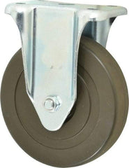 Albion - 5" Diam x 1-1/4" Wide x 6-15/32" OAH Top Plate Mount Rigid Caster - Hard Rubber, 290 Lb Capacity, Self-Lubricating Bearing, 2-7/8 x 3-5/8" Plate - Exact Tool & Supply