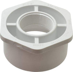Value Collection - 4 x 2" PVC Plastic Pipe Bushing - Schedule 40, Spig x FIPT End Connections - Exact Tool & Supply