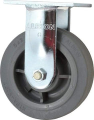 Albion - 6" Diam x 2" Wide x 7-1/2" OAH Top Plate Mount Rigid Caster - Soft Rubber, 600 Lb Capacity, Precision Sealed Bearing, 4 x 4-1/2" Plate - Exact Tool & Supply