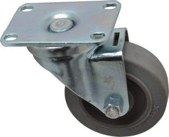 Albion - 3-1/2" Diam x 1-1/4" Wide x 4-1/4" OAH Top Plate Mount Swivel Caster - Rubber, 250 Lb Capacity, Ball Bearing, 2-1/2 x 3-5/8" Plate - Exact Tool & Supply