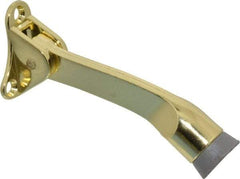 National Mfg. - 4" Projection Kickdown Door Stop - Door Mount, Brass Finish - Exact Tool & Supply