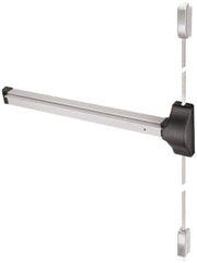 Yale - Right Hand Field Reversible, Surface Vertical Rod - Aluminum Finish, 30 to 36" Door Width, Grade 1 - Exact Tool & Supply