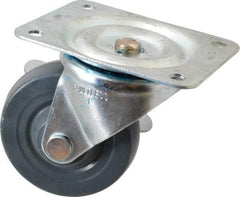 Albion - 4" Diam x 1-5/16" Wide x 5" OAH Top Plate Mount Swivel Caster with Brake - Hard Rubber, 350 Lb Capacity, Self-Lubricating Bearing, 4 x 5-1/8" Plate - Exact Tool & Supply